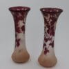 F.Theorore Legras, paire de vases balustres de la série Rubis, à décor de vignes de pêcher